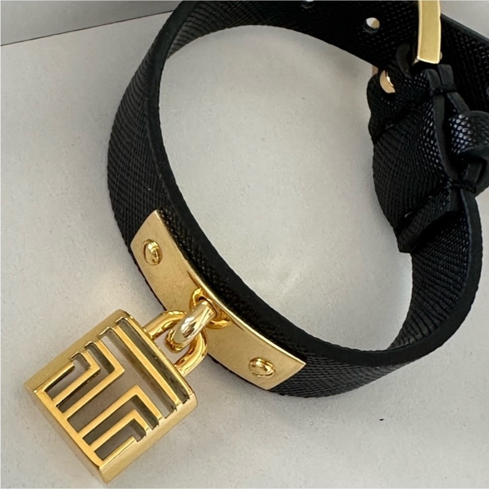 Final sale tory  Burch Black  leather and Gold Charm padlock Bracelet